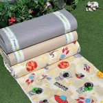 پارچه ملحفه ای عرض 240 مدل فضانورد کرم